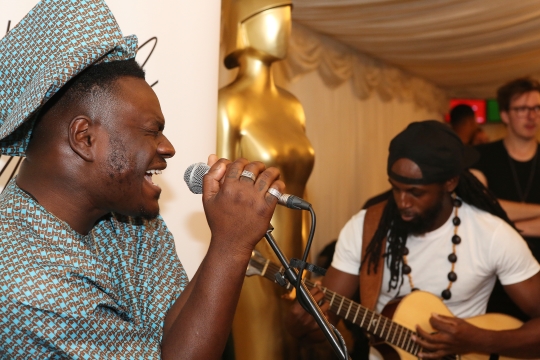 Moelogo performing at the Alliance for IP Summer Reception at the House of Commons