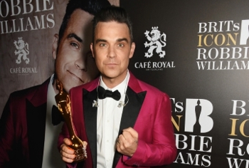 Robbie Williams gives his support for music charity as first ever patron