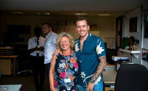 (left to right) Tina Williams & Danny Jones in the atrium entrance of The BRIT School.