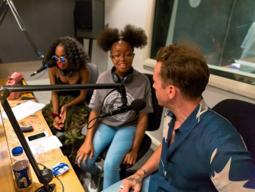 (left to right) Unknown Student, Tamara Jacks & Danny Jones live on BRIT FM.