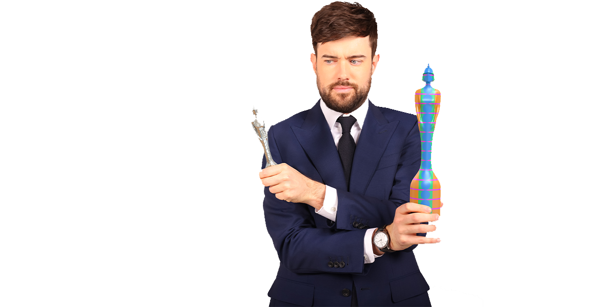 Host Jack Whitehall poses with this year’s BRIT award - a collaborative double-trophy design - ahead of show on 11th May